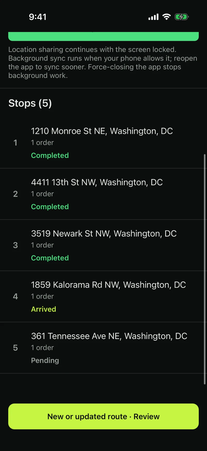 The driver app on an iPhone showing route RIV-1: stops 1 to 3 completed, stop 4 on Kalorama Road arrived, stop 5 pending, and an alert along the bottom to review a new or updated route.